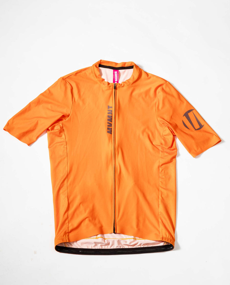 A custom MVMNT cycling jersey showing print quality and full-length zip